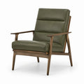 Fauteuil en cuir vert avec structure en bois de noyer